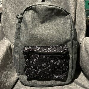 Herschel backpack Grey with Camomile flower print pocket